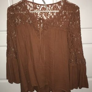Size medium cute orangish pinkish blouse